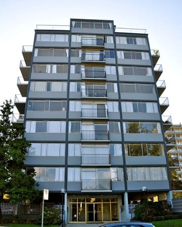 Vancouver apartment for rent - A tall building with balconies on each floor.