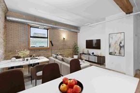 Winnipeg apartment for rent - a conference room with a table and chairs