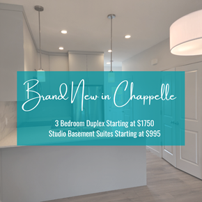 Edmonton apartment for rent - a brand new in chapter sign on a wall in a lobby