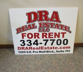 Pullman apartment for rent - A sign advertising a real estate company for rent.