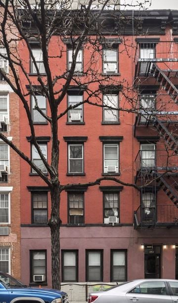 New York apartment for rent - a brick building with a tree in front of it