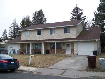 Pullman apartment for rent - a house with a car parked in front of it
