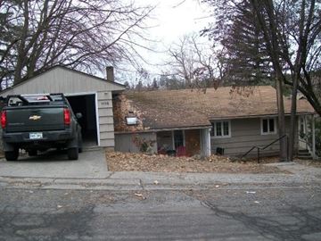 Pullman apartment for rent - a truck is parked in front of a house