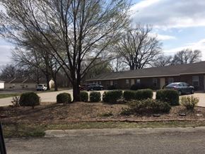 Butler apartment for rent - a house with a yard in front of it