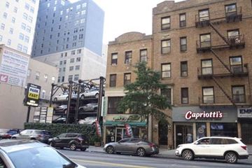 Brooklyn apartment for rent - A Capriotti's restaurant is located on the corner of a street.