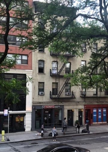 New York apartment for rent - a building on the corner of a city street