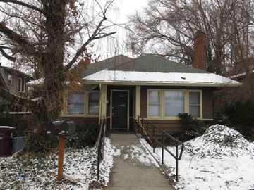 Pullman apartment for rent - A house with a black door and a mailbox.