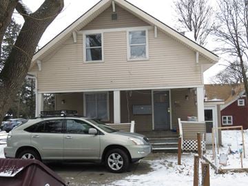 Pullman apartment for rent - a car parked in front of a house