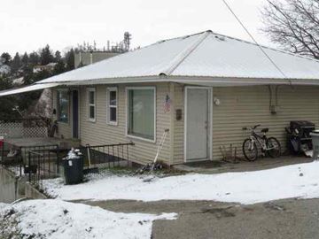 Pullman apartment for rent - a house with a bike parked in front of it