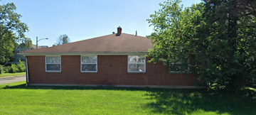Columbus apartment for rent - a brick house with a tree in front of it
