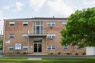 Columbus apartment for rent - a brick building with a tree in front of it
