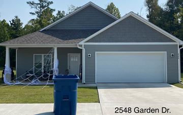 Benton house for rent - a house with a garbage can in front of it