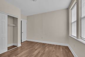 Washington apartment for rent - the living room of an apartment with wood flooring and a closet