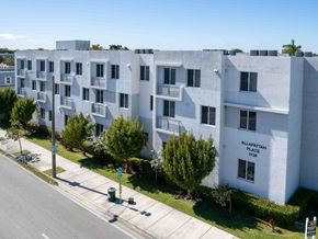 Miami apartment for rent - an aerial view of an apartment building on a city street