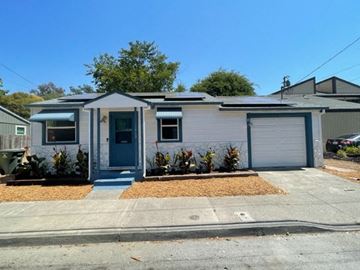 Santa Rosa apartment for rent - A small house with a blue door and white walls.