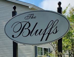 Lewiston apartment for rent - the bluffs sign in front of a house