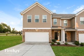 Huntersville house for rent - A two-story house with a garage is for sale.