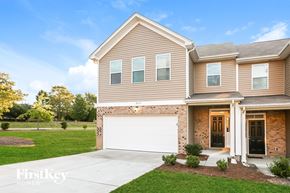 Huntersville house for rent - A house with a garage is shown in the image.