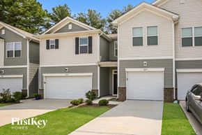 Concord house for rent - A two-story house with a garage is for sale.