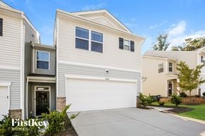 Concord house for rent - a white house with a white garage door