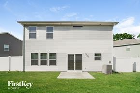 Charlotte house for rent - the exterior of a white house with a driveway and grass
