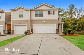 Concord house for rent - A large, two-story house with a garage is for sale.