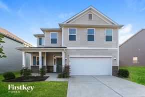 Charlotte house for rent - A two-story house with a garage is for sale by FirstKey Homes.