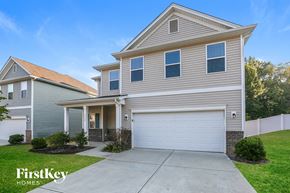 Charlotte house for rent - A two-story house with a garage is for sale by FirstKey Homes.