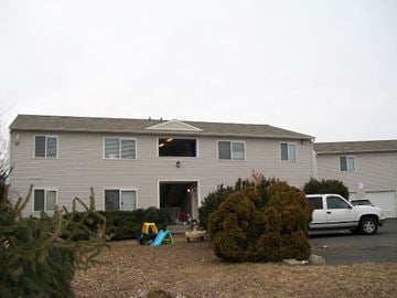 Pullman apartment for rent - a house with a white truck parked in front of it