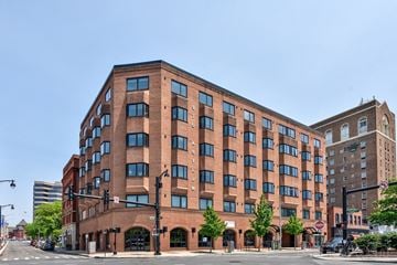 Hartford apartment for rent - a large brick building on the corner of a city street