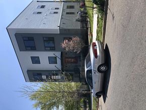 Washington apartment for rent - a house with a car parked in front of it