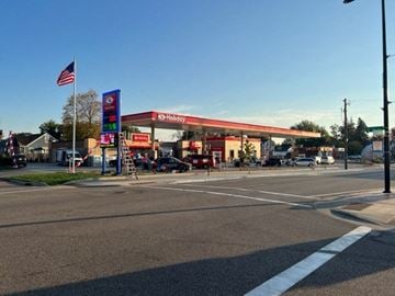 South St. Paul apartment for rent - a gas station on the corner of a street