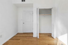 East Orange apartment for rent - A room with a white door and a white wall.