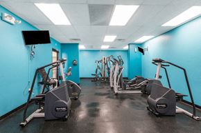 Madison Heights apartment for rent - A gym with treadmills and elliptical machines.