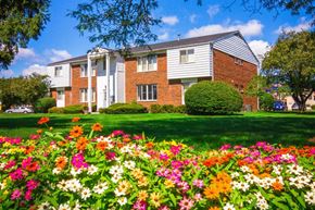 Warren apartment for rent - A large building with a lawn in front of it.