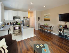 Beverly Hills apartment for rent - a living room with a kitchen and a dining room