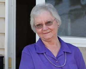 Springfield triplex for rent - an older woman wearing glasses and a purple shirt