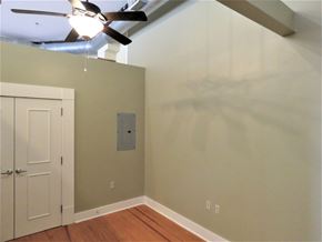 Little Rock apartment for rent - a bedroom with a closet and a ceiling fan