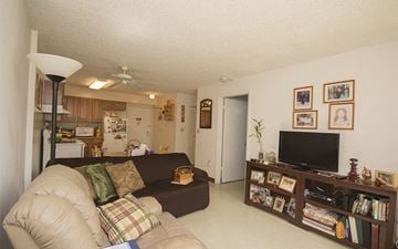 Miami apartment for rent - a living room with a couch and a tv