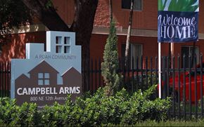 Homestead apartment for rent - a sign in front of a building