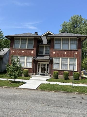 Little Rock apartment for rent - a brick house with a sidewalk in front of it
