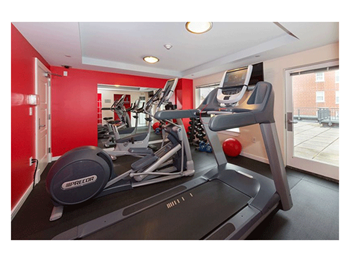Newly renovated fitness room with precor equipment and free weights