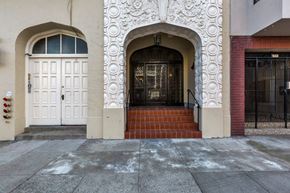 San Francisco apartment for rent - A white door is on the left and a black door is on the right.