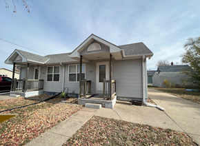 Fremont apartment for rent - A house with a grey roof and a grey front porch.