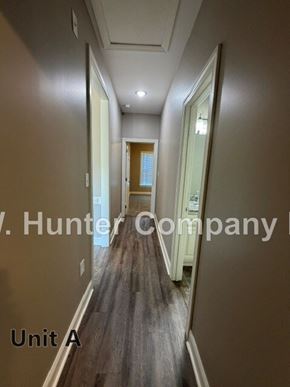 Wilson apartment for rent - A hallway with the words "Hunter Company" and "Unit A" on the wall.