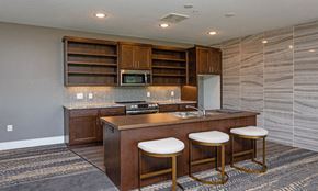 St Cloud apartment for rent - a kitchen with a counter and three stools