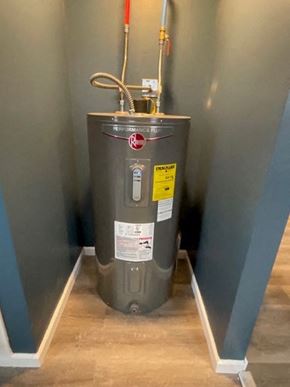 Medina house for rent - a water heater in the corner of a room