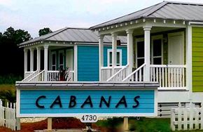 Ocean Springs apartment for rent - a blue sign on the front of a house
