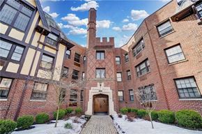 Dayton house for rent - the front of a brick building with a wooden door