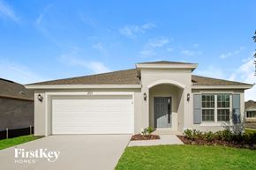 Winter Haven house for rent - A house with a garage door that says 20 on it.